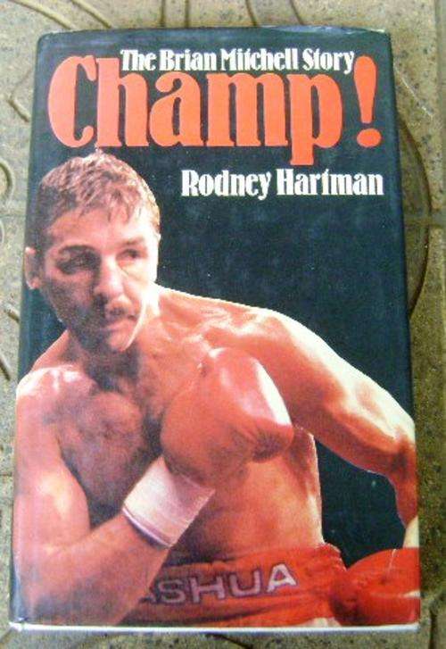 CHAMP!!!! THE BRIAN MITCHELL STORY SIGNED BY THE CHAMP HIMSELF!!!!