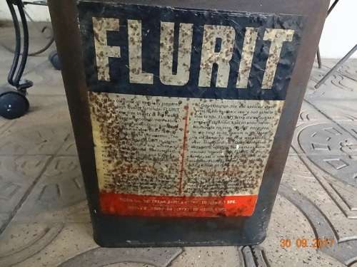 OLD FLURIT OIL TIN BY MOBIL OIL COMPANY HALF FULL
