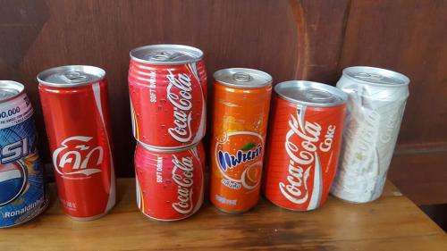 VINTAGE   COCA-COLA ASSORTMENT CANS INCLUDING 2 EMPTY ERROR CANS