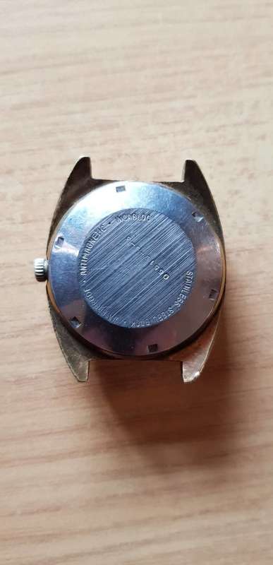VINTAGE OLMA SWISS DUO DATE AUTOMATIC WATCH. RUNNER