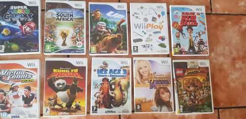 Wii COMPLETE WITH ACCESSORIES AND 16 GAMES.