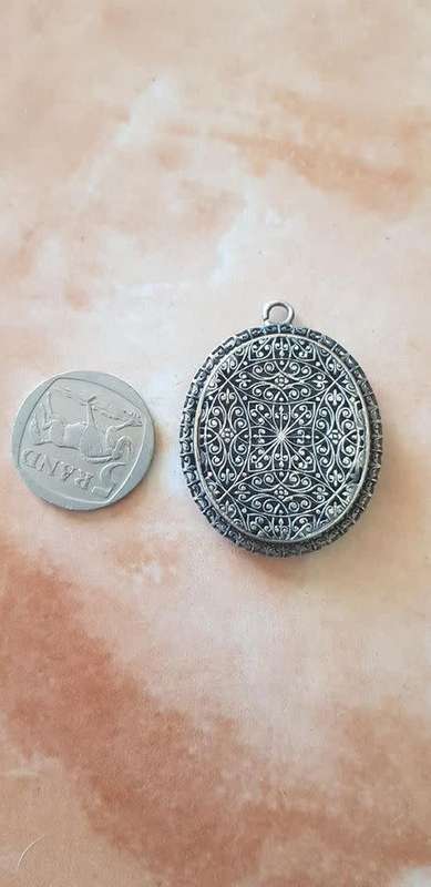 ANTIQUE FILIGREE LOCKET