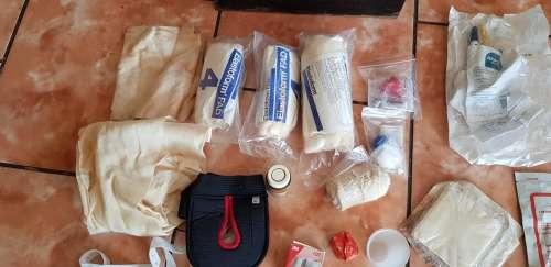 VINTAGE TINPLATE FIRST AID KIT WITH CONTENTS