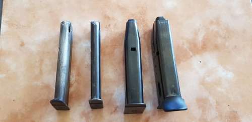 ONE MAG ONLY SECOND FROM RIGHT