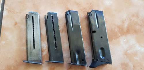 ONE MAG ONLY SECOND FROM RIGHT