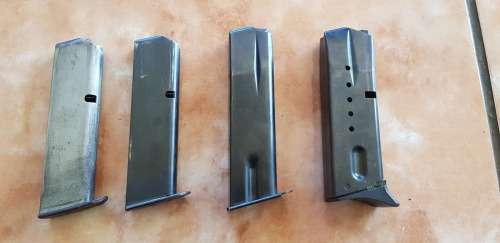 ONE MAG ONLY SECOND FROM RIGHT