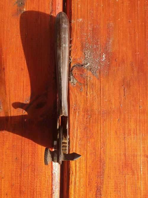 ANTIQUE TIN OPENER.