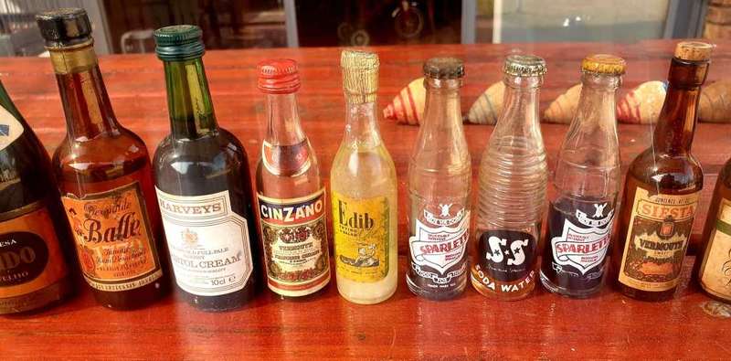 LOT OF VINTAGE MINIATURE BOTTLES MANY WITH CONTENTS