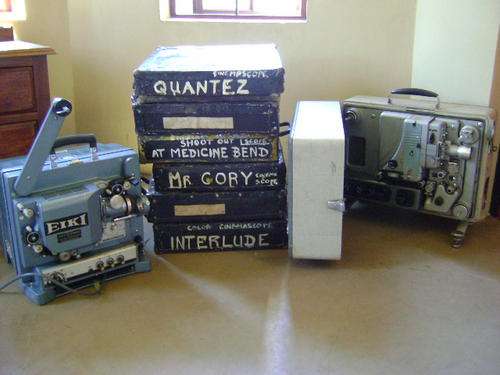 WORKING PROJECTORS FROM THE OLD MAYFAIR AND RITZ BIOSCOPES WITH ORIGINAL FILM REELS IN CASES
