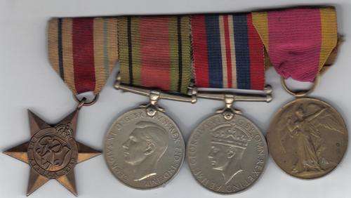 ORIGINAL BAR MOUNTED GROUP OF MEDALS WW1 - WW2 MARKED