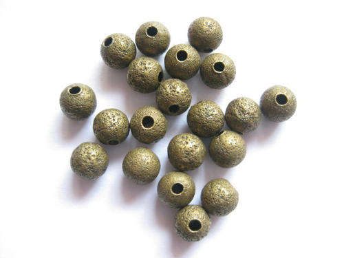 Spacer, round with texture, bronze, 20pcs