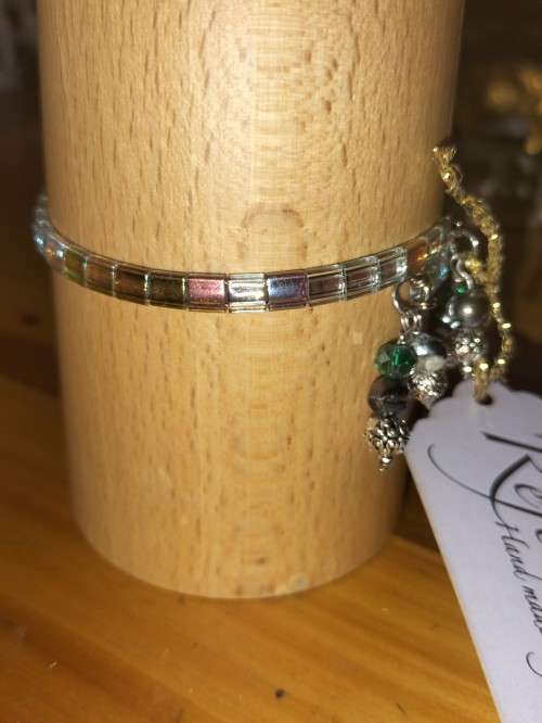 Tila metallic green bracelet . B83
