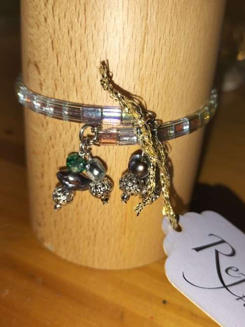 Tila metallic green bracelet . B83