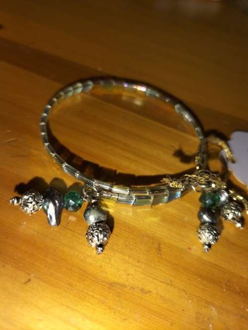 Tila metallic green bracelet . B83