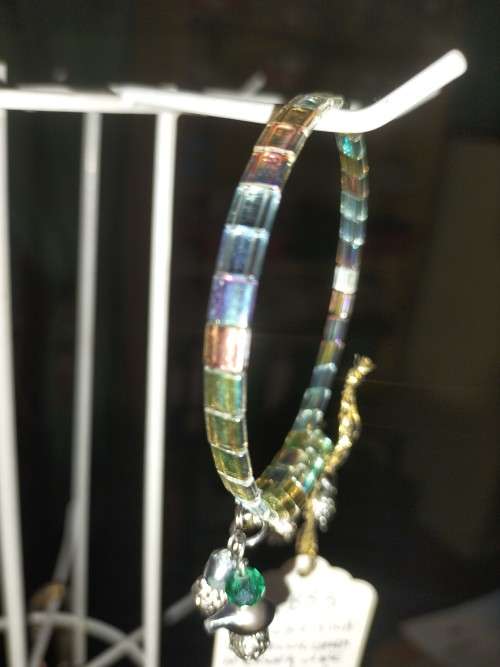 Tila metallic green bracelet . B83