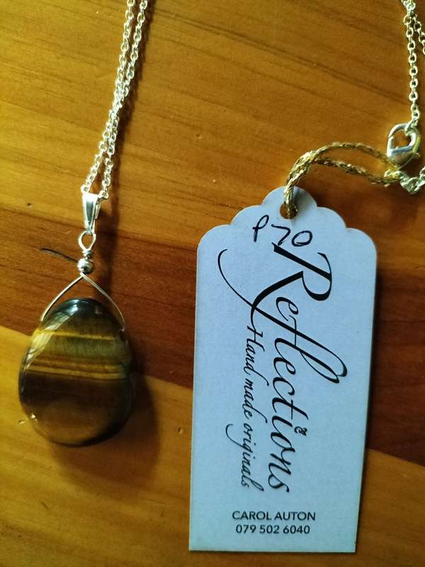 Sterling Silver Tigers Eye pendant. P70