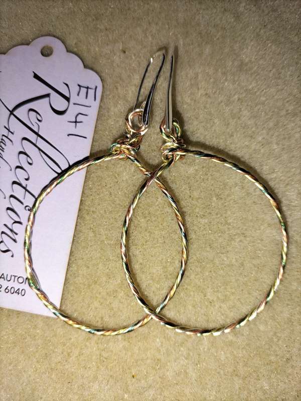 Mixed plated metal twisted 40mm hoops. E141