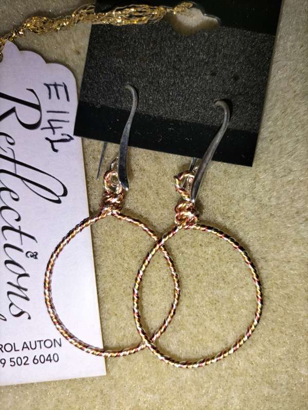 Mixed pl metal delicate twisted 25mm hoops. E142