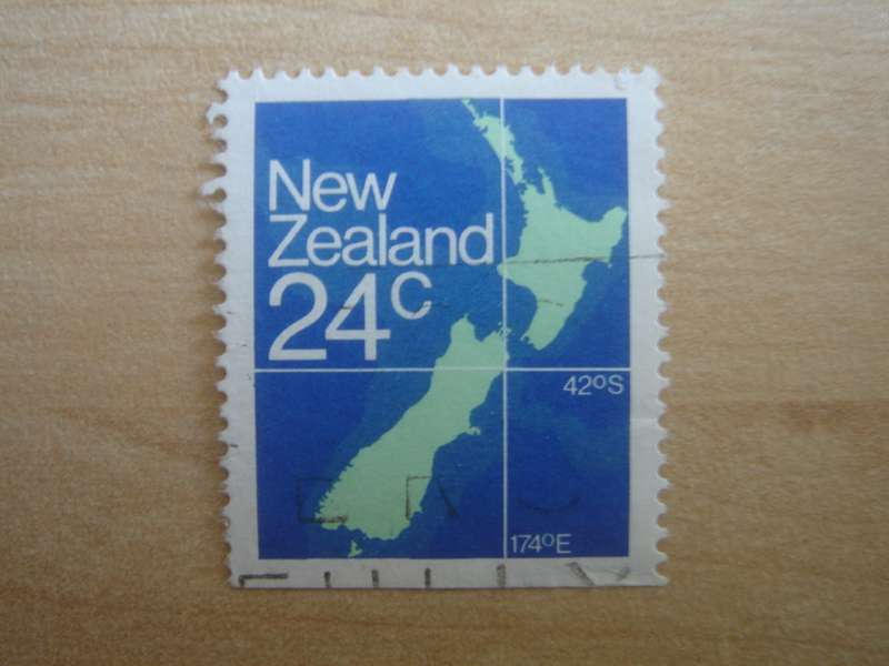 1982 NZ Map 24 c cut at bottom used, stamped