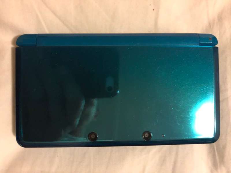 aqua blue Nintendo 3DS console with 16 games (EUR)