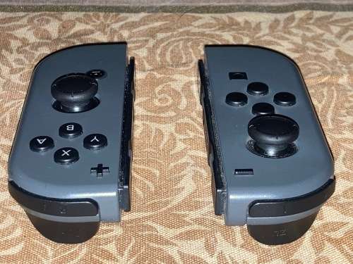 grey Nintendo Switch Joy-Con pair with Grip