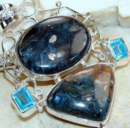 PIETERSITE AND TOPAZ SET IN STERLING SILVER.925 (RARE )