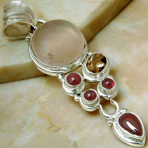 Fancy rose quartz  and garnet 925 sterling silver pendant