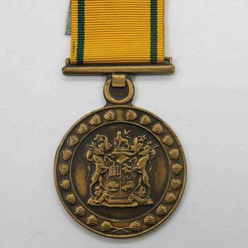 Full size - South African Prison Service 10 Year Long Service Medal. Named to Sgt. M.J Tshabala