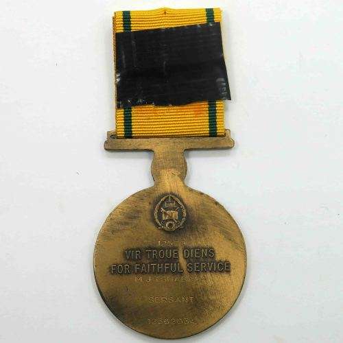 Full size - South African Prison Service 10 Year Long Service Medal. Named to Sgt. M.J Tshabala