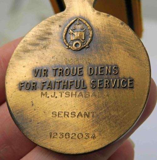 Full size - South African Prison Service 10 Year Long Service Medal. Named to Sgt. M.J Tshabala