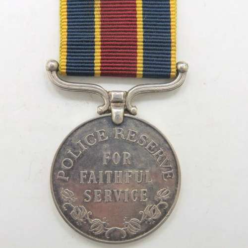 FULL SIZE: Rhodesia Police Reserve for Faithful Service Medal. Issued to C.B Shand
