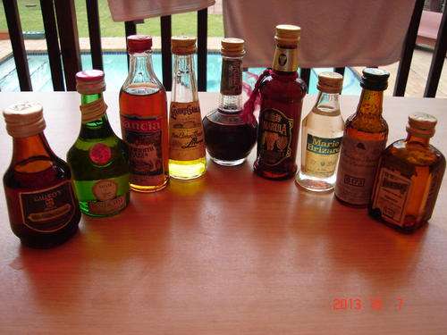 Lot of 9 Vintage liquor bottles bid per bottle