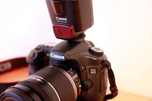 Canon EOS 40D + Battery grip + Canon EF-S IS 18-200mm lens and 430EX flash