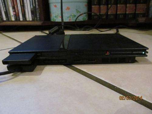 PS 2 Slim + 2 Controls +23 Games +Memory Card+Card Ext.