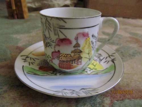 FINE CHINA !! Cup and Saucer set. Cup is almost translucent - VERY FRAGILE