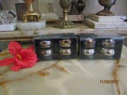 STUTTAFORDS !! Two Sets of Silver Plated Napkin Rings - Four Per Set - Boxed