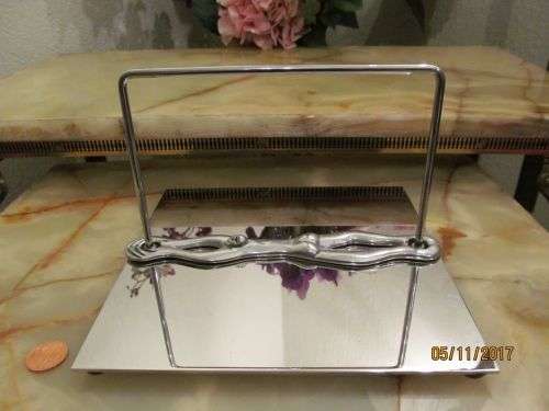 CARROL BOYES !! Designer Item by Carrol Boyes - Breaststroke Serviette/Napkin Holder