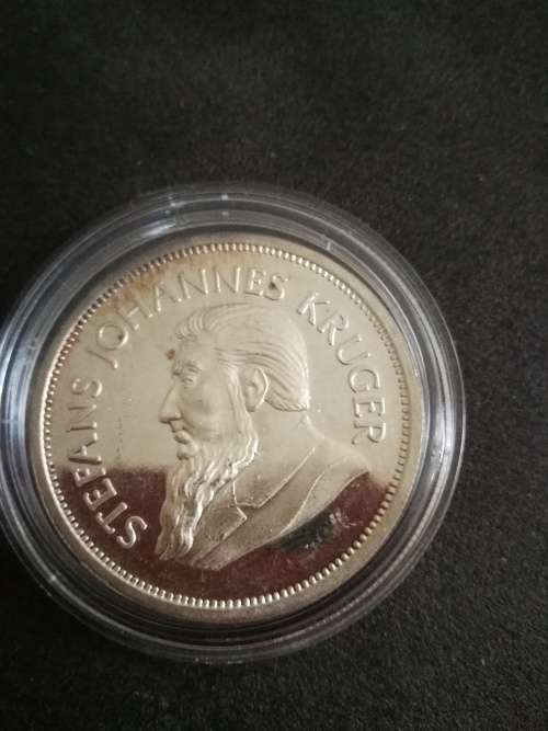 Kruger commemorative 1 troy ounce silver medallion in a capsule some toning