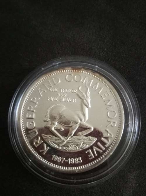 Kruger commemorative 1 troy ounce silver medallion in a capsule some toning