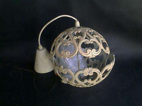retro/vintage caste iron ceiling light in shape of a ball. piece broken off but supplied with item.