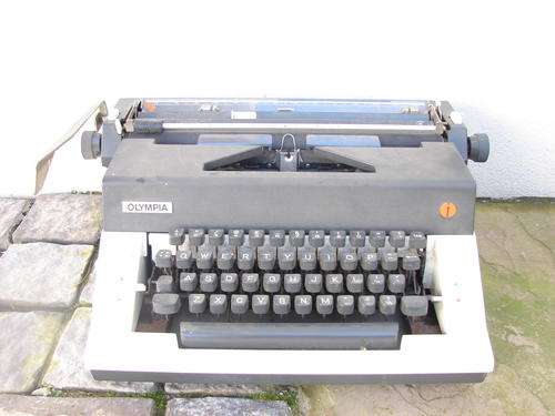 OLYMPIA PORTABLE TYPEWRITER!!