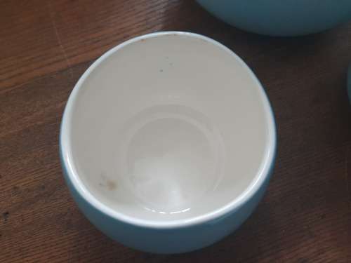 Continential designers tea pot and 2 holders