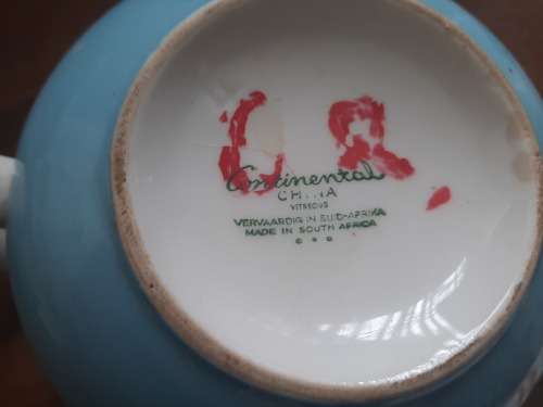 Continential designers tea pot and 2 holders