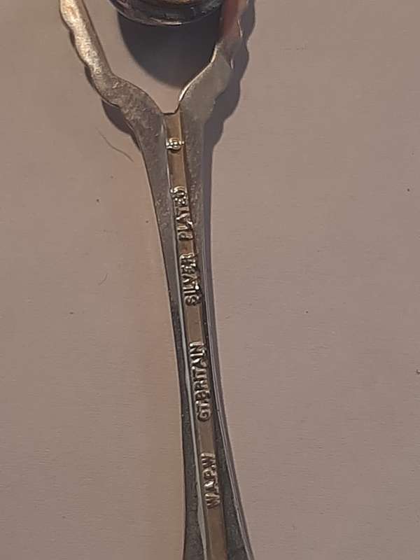 Stunning silver plated teaspoon with enamel sign, made in Britian