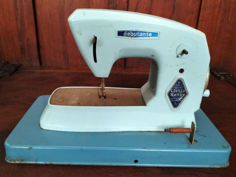 Vintage tin toy sewing machine