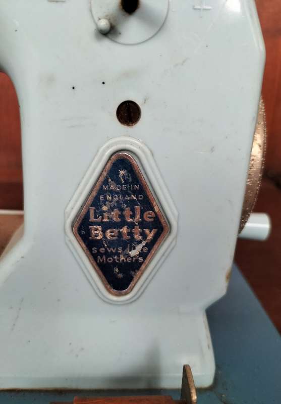 Vintage tin toy sewing machine