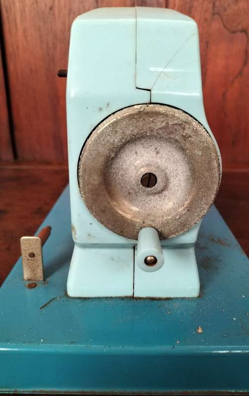 Vintage tin toy sewing machine