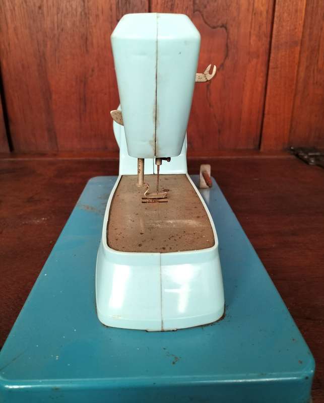 Vintage tin toy sewing machine