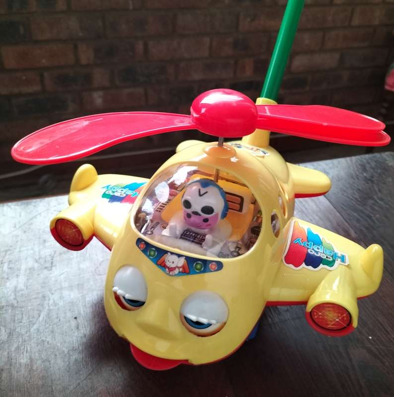 Push-a-long toy plastic helicopter
