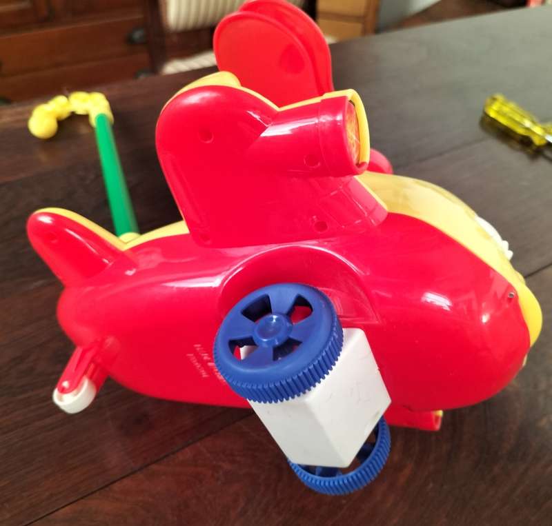 Push-a-long toy plastic helicopter